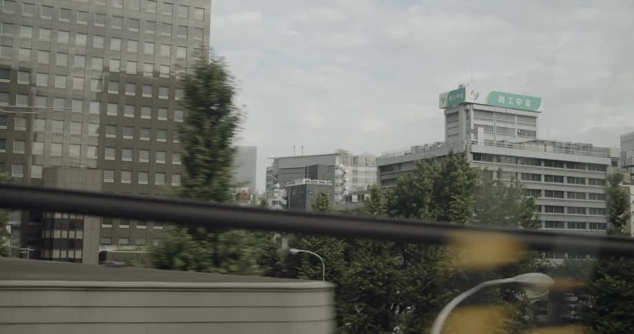 Traveling through city on cloudy day