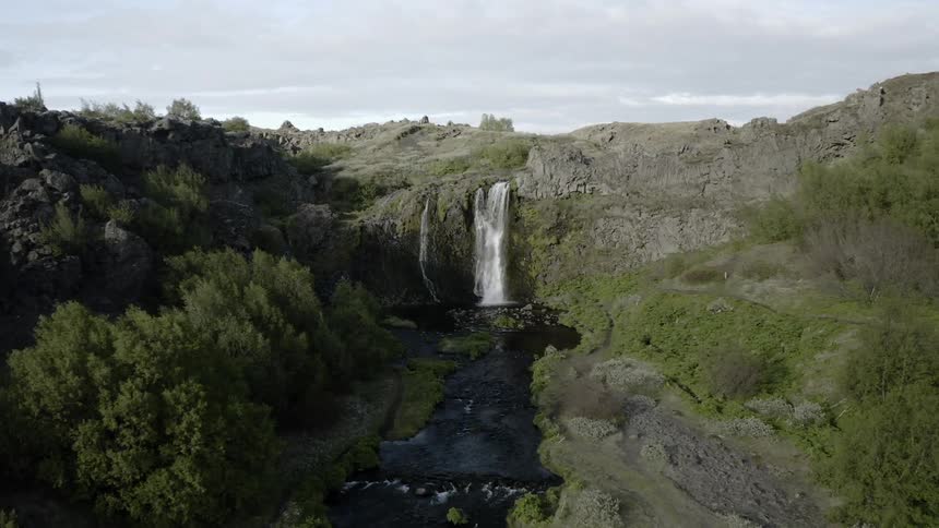 Water falls down into the river