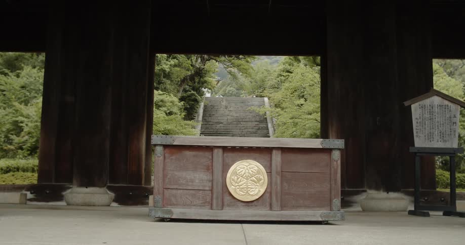 The crate has a gold sign on it