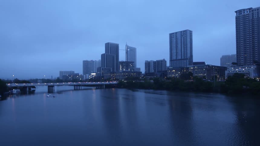 Vehicles pass over the city bridge