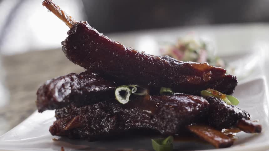 Ribs are served on a plate