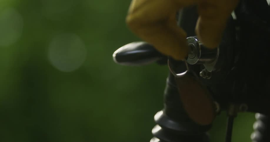 A motorcycle key is turned