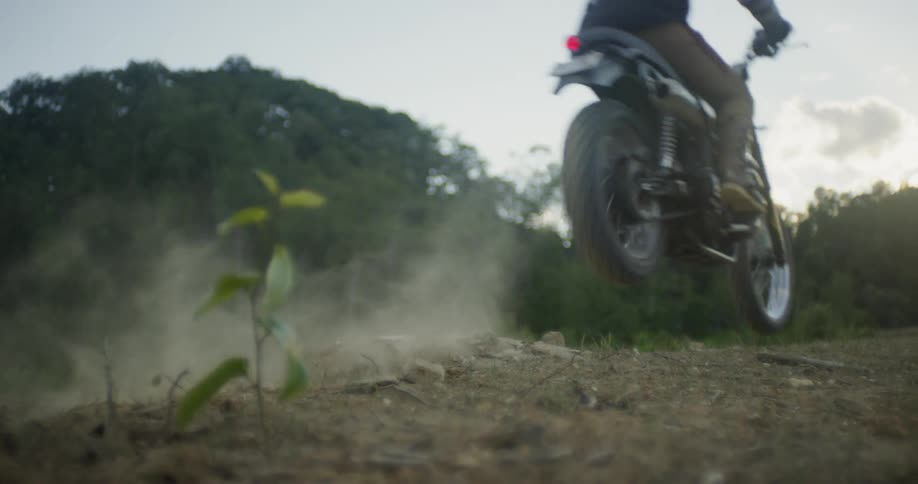 A man rides on a dirt bike