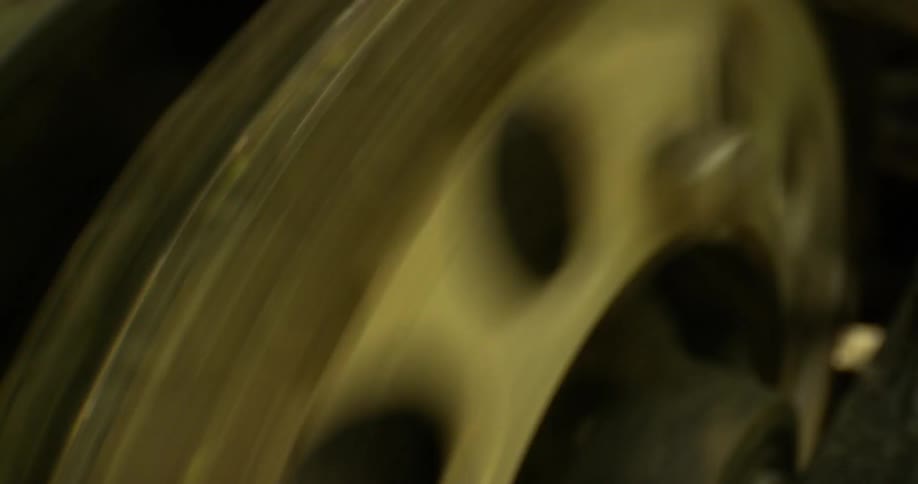 A chain drive turns and stops