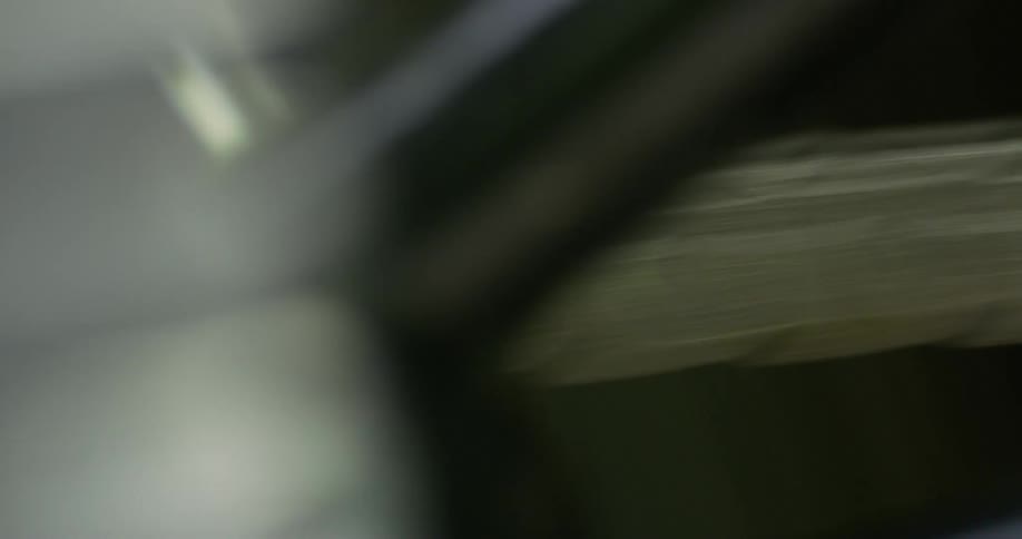 A chain on a gear and a wheel start up and turn