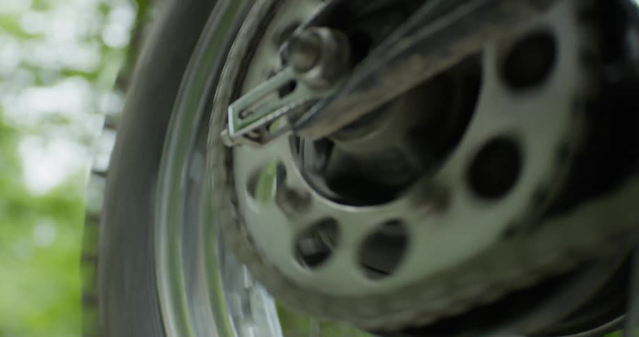 A motorcycle is driven on a rural road