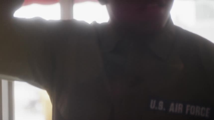 A service member enters a restaurant