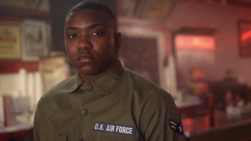 A soldier stands in a diner