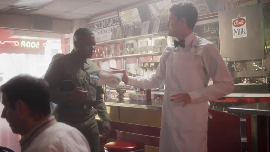 A black airman walks into a diner and is stopped and turned away
