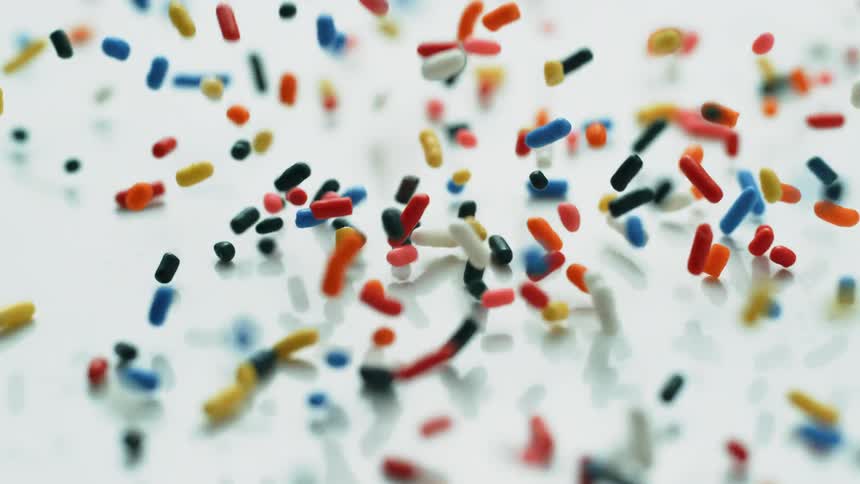 Pills fall and bounce on the counter