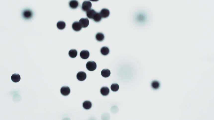 Blue balls fall and bounce on a white background