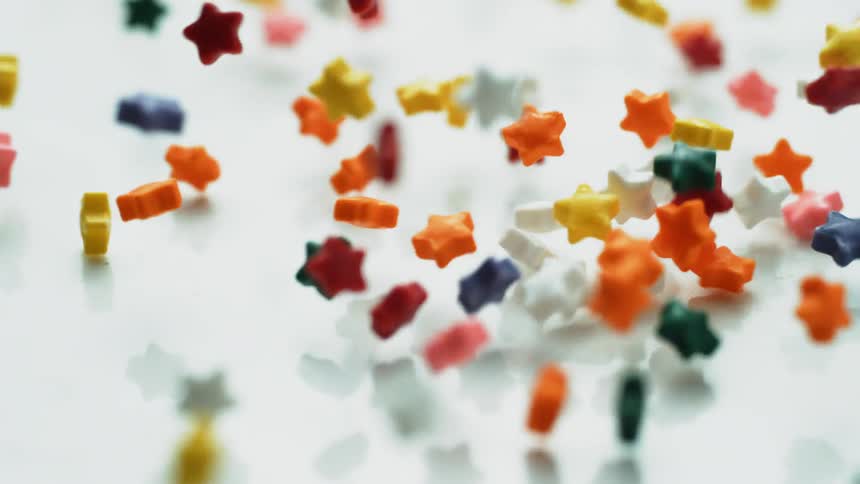 Star shaped pills fall onto the counter