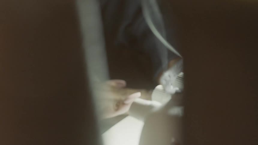 A woman uses a sewing machine