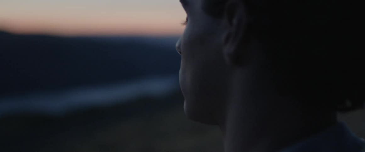 A man stands in the breeze