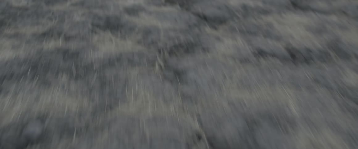 Passing over cracked ground and grass patches
