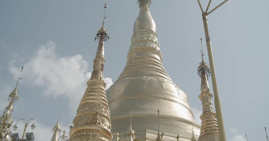 Sun shines over a large golden temple