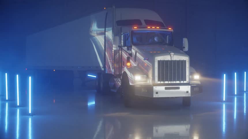 White semi truck parked in warehouse