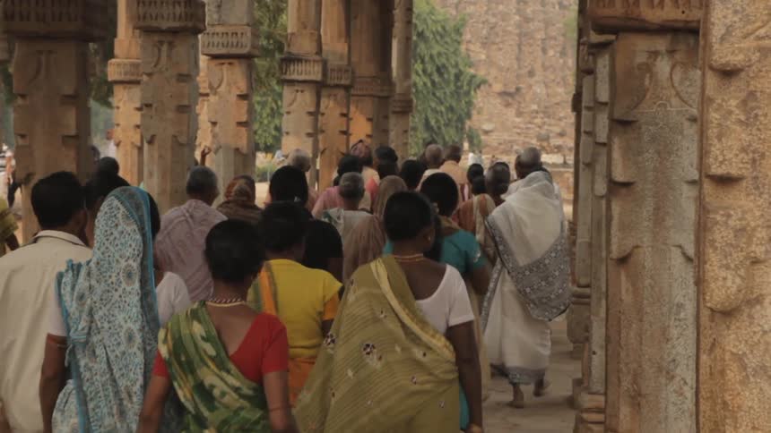A large group of people walk together