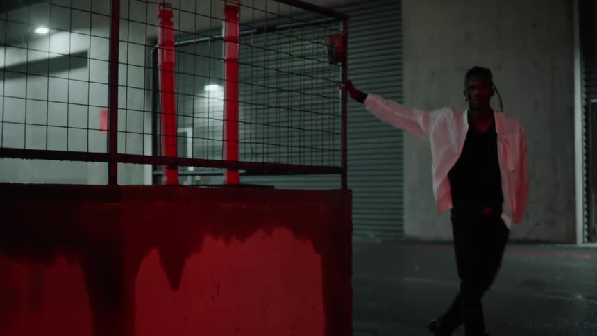 A man is startled as he walks at night