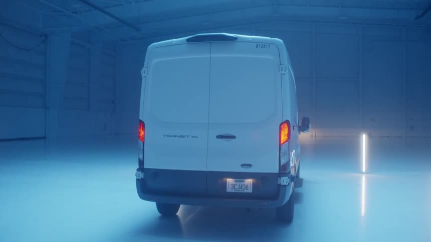White van is parked in warehouse