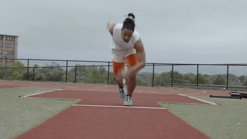 A track athlete takes off from his stance