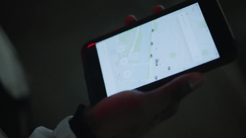 A person looks at a map on a smartphone