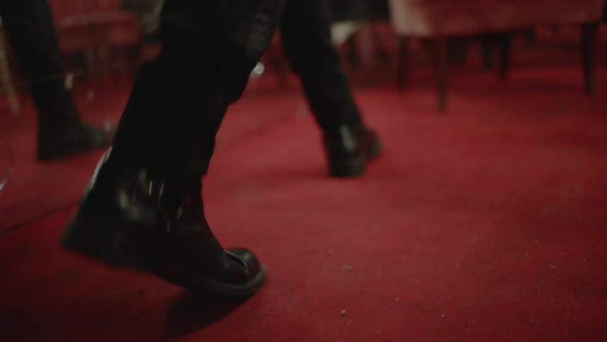 A man walks into the room