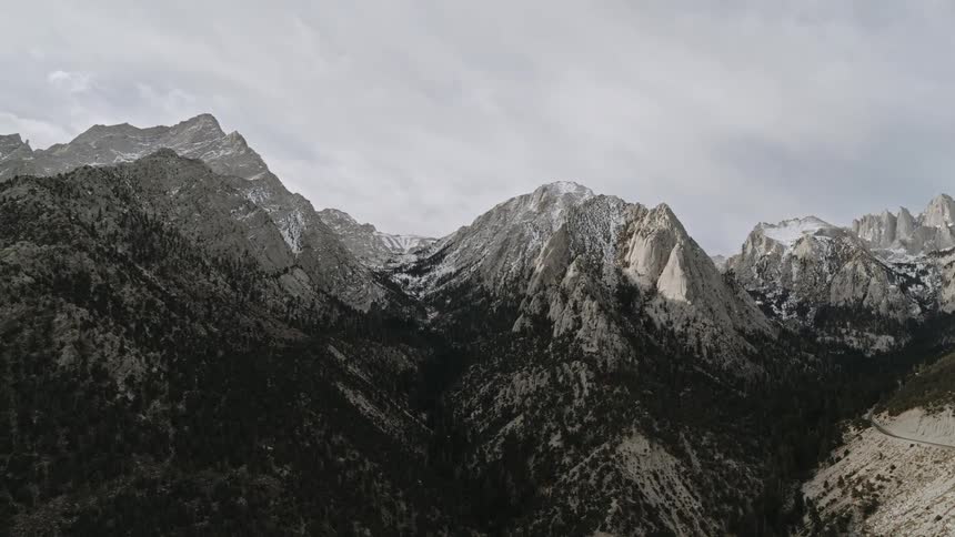 Mountains during the day near clouds