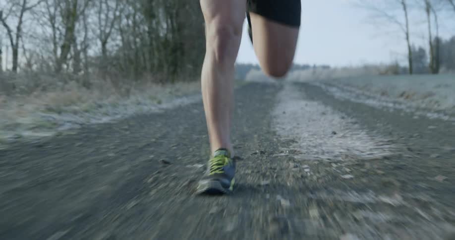 Man Jogging In Woods