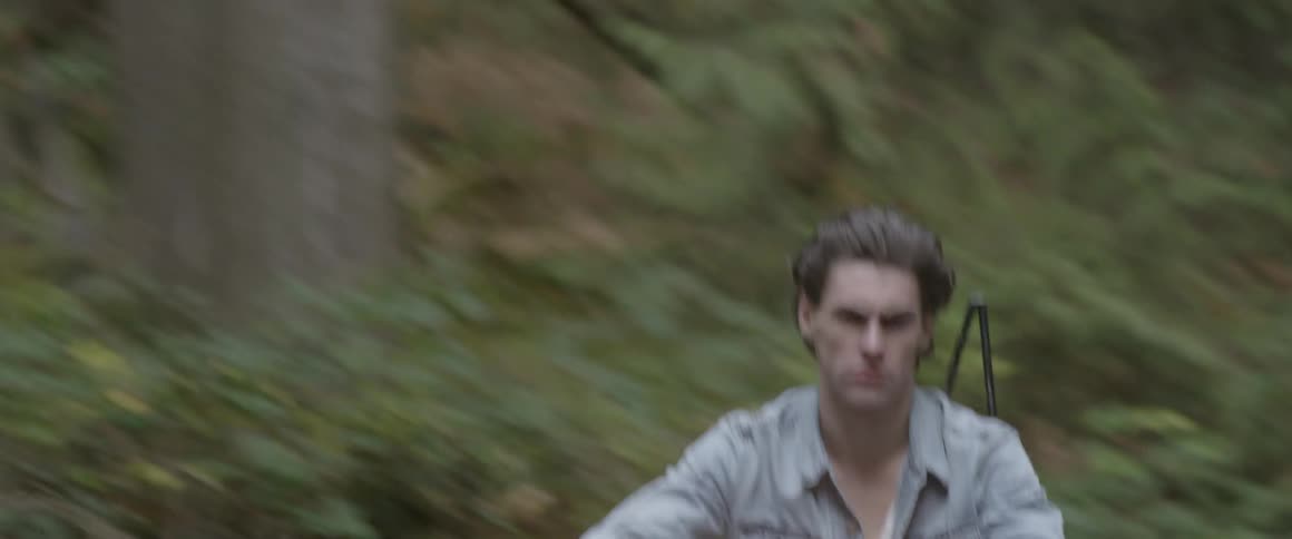 A man rides a motorcycle