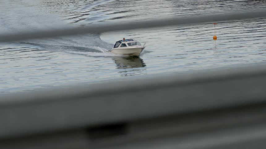 Boats float on a body of water