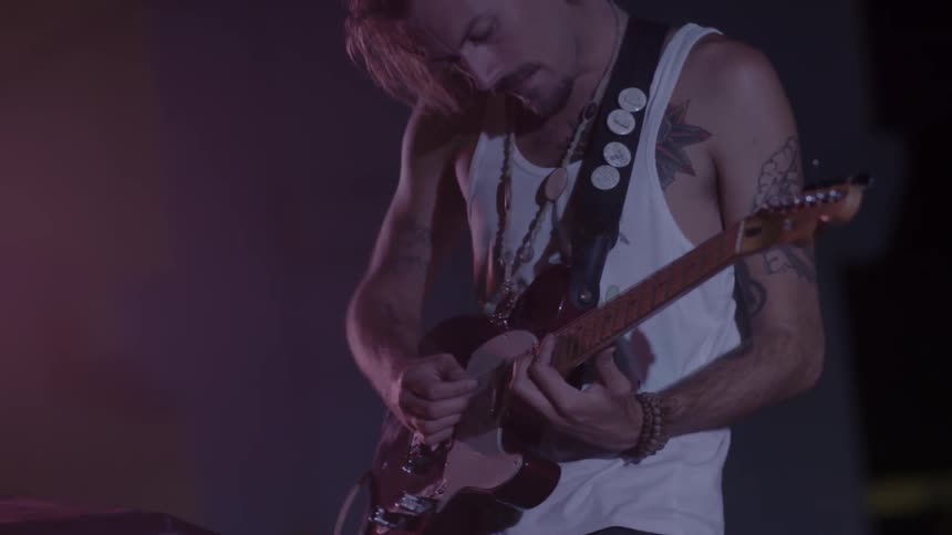 A musician performs live at a concert