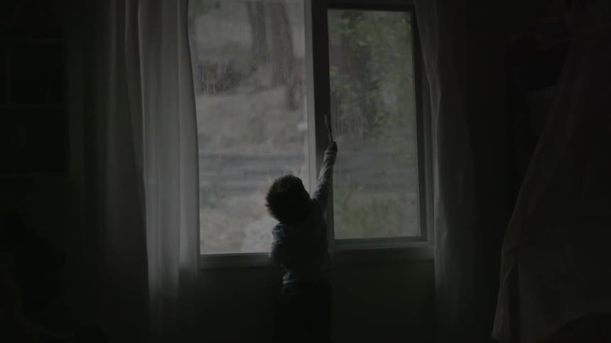 A person reaching up to the sky
