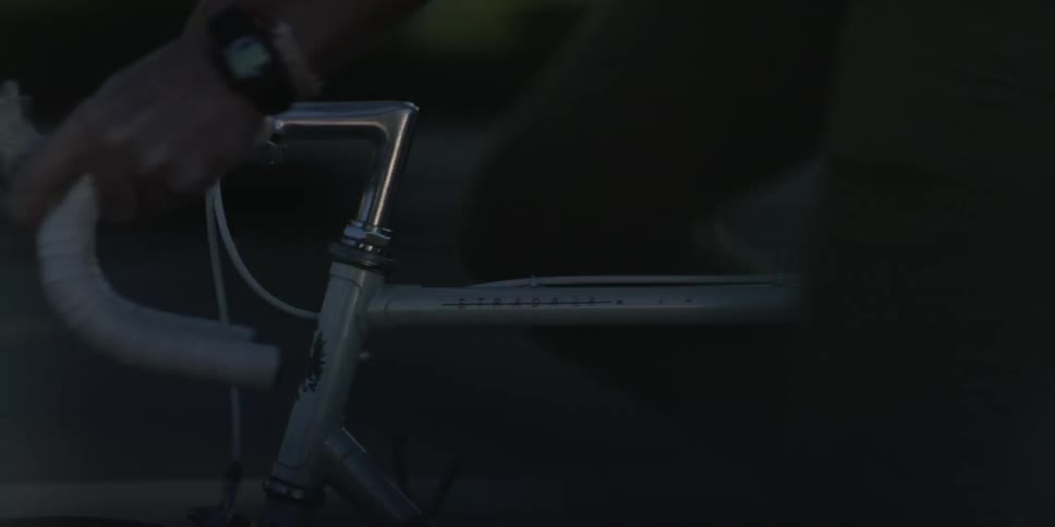 A man rides a bicycles