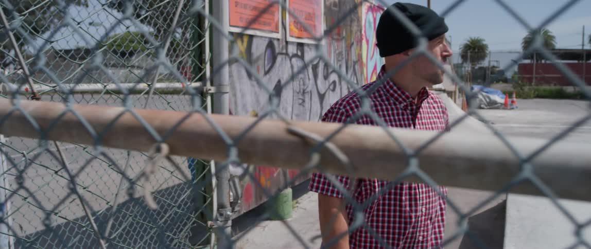 A man walks into the skate park
