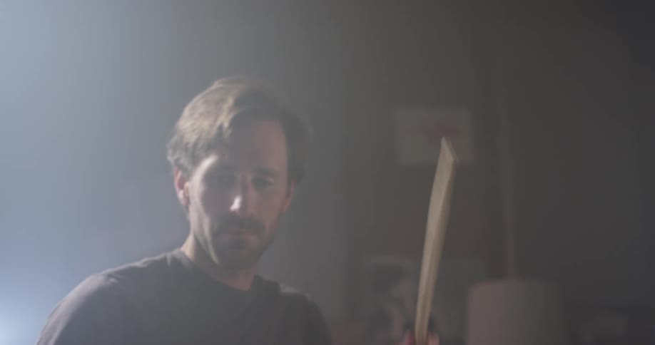 A man plays on the drum set