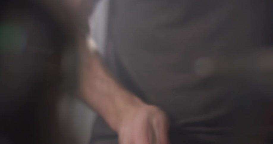 A man plays the drums