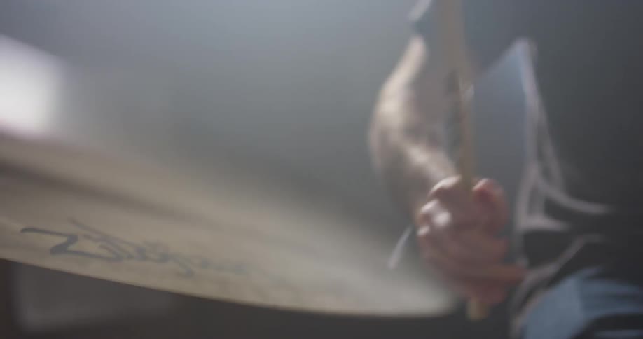 A man plays the drums