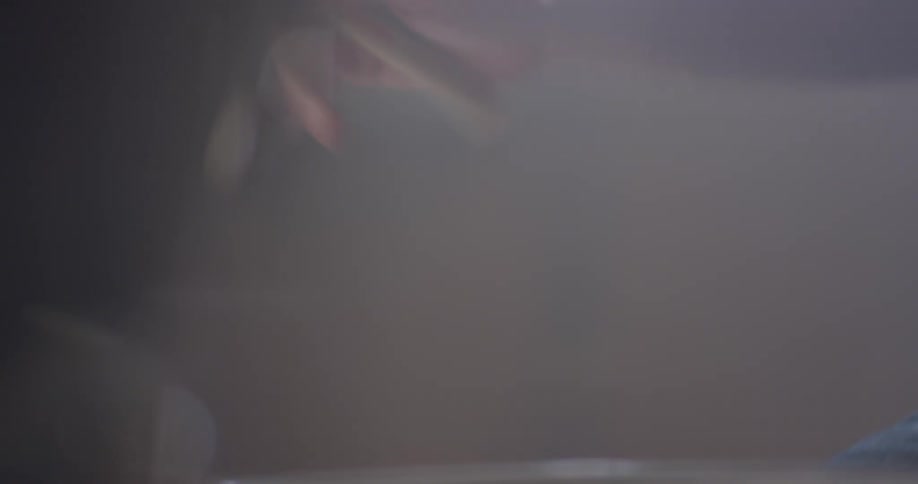 A man plays the drums