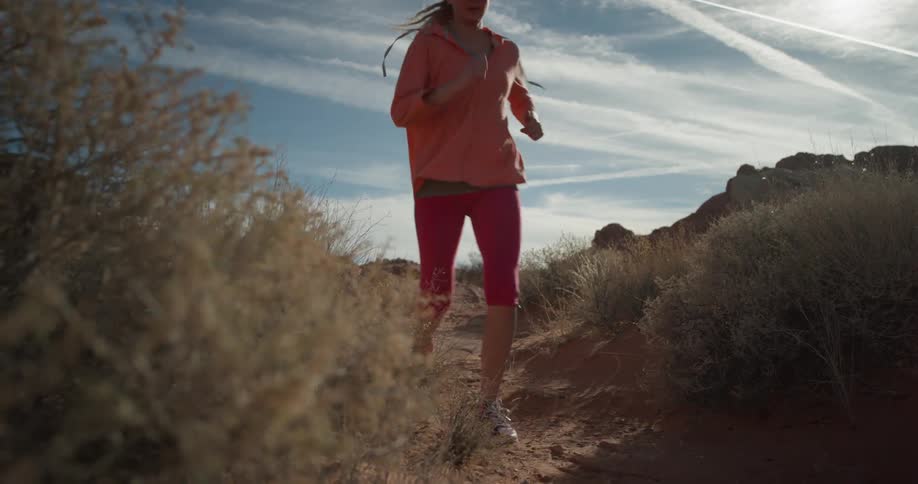 Woman Exercising In The Desert