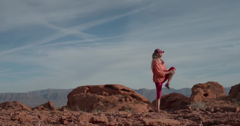 Woman Exercising In The Desert