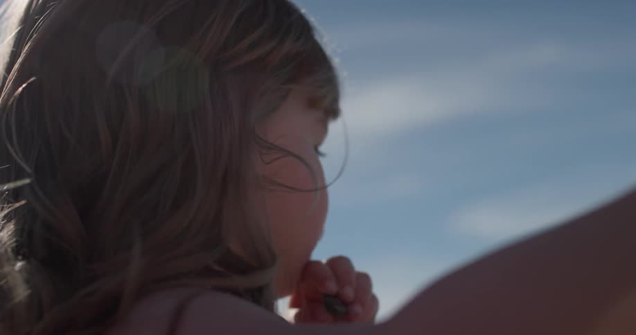 Child looks down and walks away