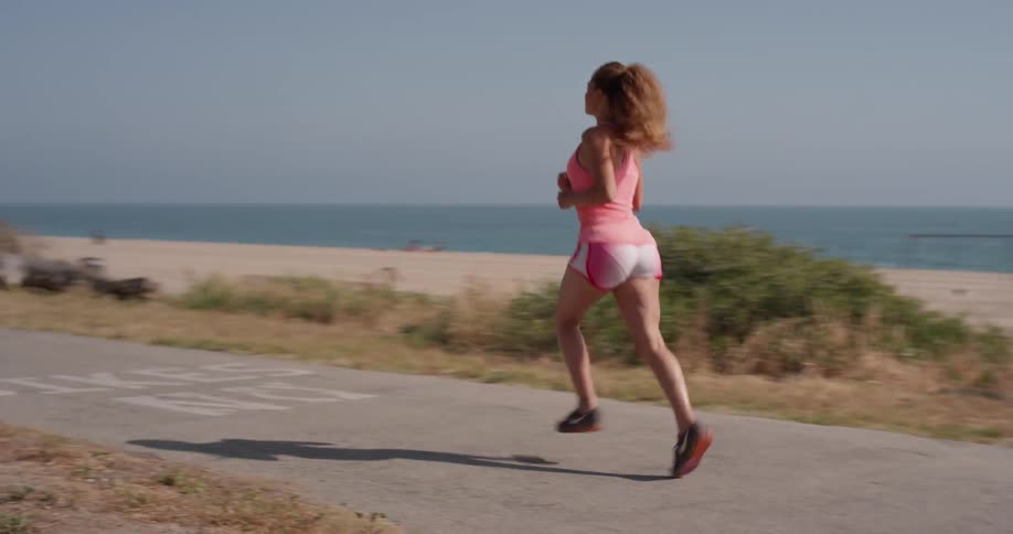 Woman Running In Nature