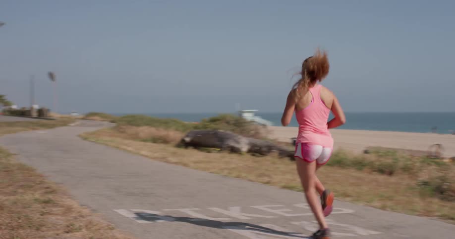 Woman Running In Nature