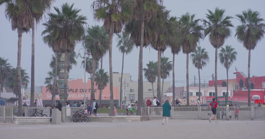 The people are jogging near the town