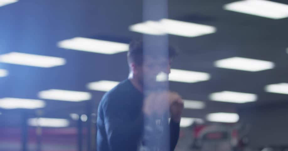 A man trains by throwing punches