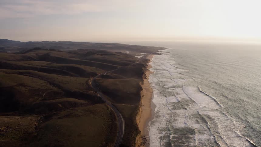 Ocean waves flow towards a shoreline