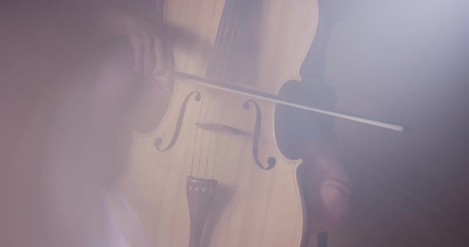 A woman plays the cello