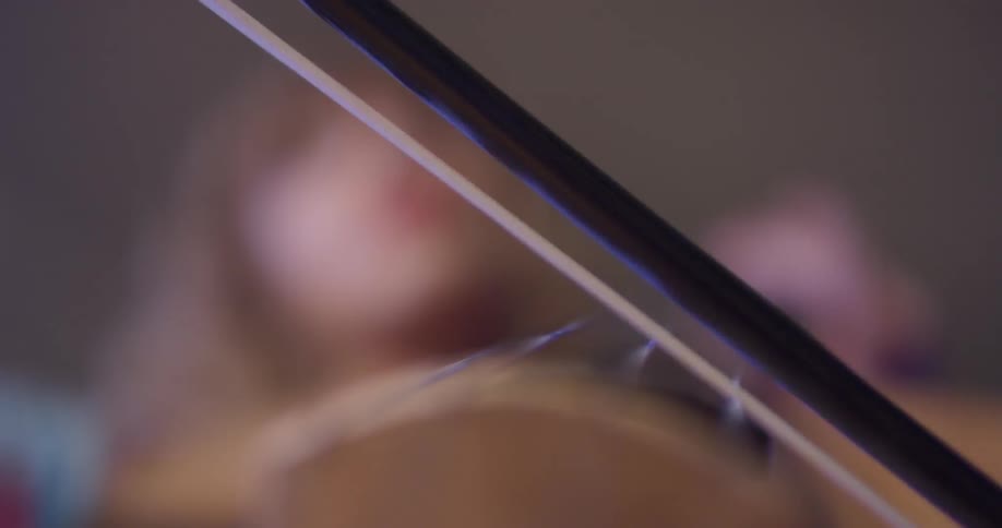 Woman is playing the cello