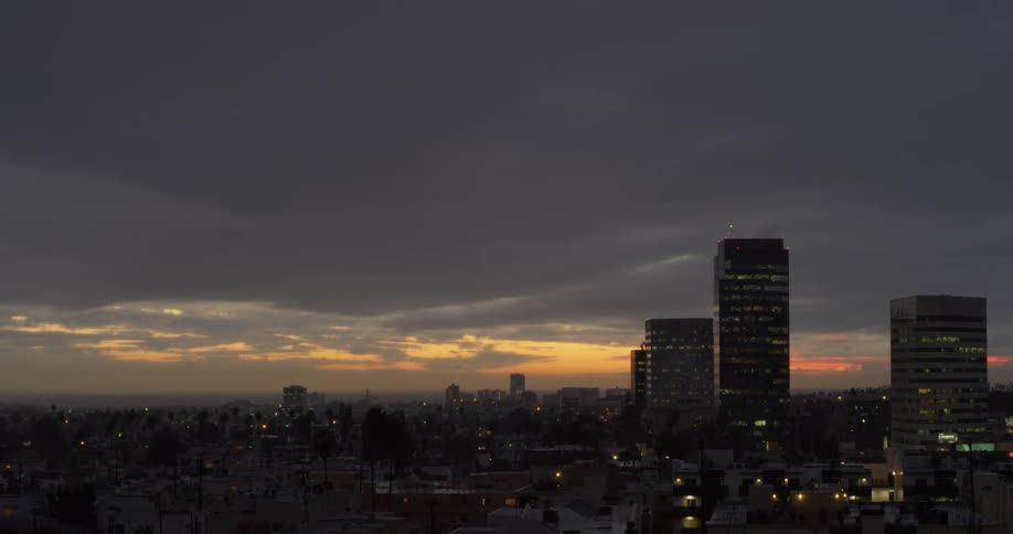 The sun is nearly set on the city